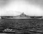 Broadside view of USS Intrepid off Norfolk Navy Yard, Portsmouth, Virginia, United States, 25 Nov 1943. Note the blank starboard side of the ship; later photos will show the addition of anti-aircraft gun sponsons.