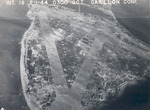 Strike photo taken from USS Intrepid aircraft showing severe damage to the runways and the surrounding areas on Roi Island, Kwajalein Atoll, Marshall Islands, 1 Feb 1944.