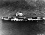 USS Enterprise in her new Measure 33-4Ab paint scheme leaving Pearl Harbor, Hawaii for exercises, 4 Aug 1944. Photo 1 of 4.