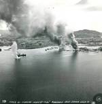 Strike photo taken from planes flying from USS Essex of the attack on Surigao Harbor in northern Mindanao, Philippine Islands, 9 Sep 1944