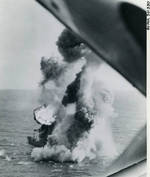 Japanese 4,500 ton cargo ship exploding under a bombing attack from US carrier aircraft south of Cam Ranh Bay, French Indochina (Vietnam), 12 Jan 1945.