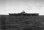 Port side view of the USS Bunker Hill while at sea off the Palau Islands, 27 Mar 1944. Note the Measure 32, Design 6A paint scheme, only two carriers were painted this way.