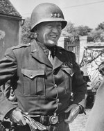 LtGen George Patton as he prepares to offer congratulations to his Third Armored Division for sweeping across northern France and crossing the River Seine northwest of Paris, 26 Aug 1944