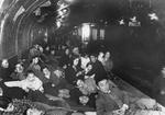 Civilians in a subway platform air raid shelter, Madrid, Spain, 9 Dec 1936