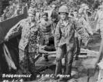 US Marines evacuating a wounded comrade, Bougainville, Solomon Islands, 1943-1944