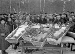 Burial service of two Jewish and two Russian resistance fighters of the Molotava Brigade, near Pinsk, Poland (now in Belarus), 1944