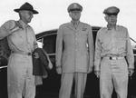 General Joseph Stilwell, Major General Patrick Hurley, and Major General Daniel Sultan awaiting for a flight to Chongqing, China at the airport in New Delhi, India, Sep 1944