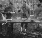 Lieutenant General George Campbell and Lieutenant General Joseph Stilwell eating breakfast, northern Burma, Mar 1944