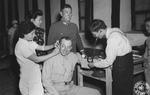 US Army Major General Gilbert Cheves and Chinese Army Lieutenant General Lu Tso donating blood to the Chinese Blood Bank, China, 1944-1945