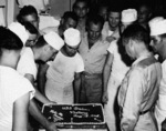 Victory cake aboard USS Oahu, Eniwetok, Marshall Islands, 15 Aug 1945