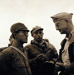 US Navy Chaplain Charles Robinson speaking with a Japanese prisoner of war, Tokyo, Japan, Sep 1945