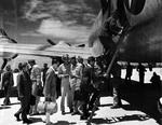 Aboard two Mitsubishi G4M ‘Betty’ bombers in surrender markings, a Japanese delegation stopped at Ie Jima, Ryukyu Islands en route Manila, Philippines for a surrender briefing, 19 Aug 1945. Photo 10 of 12.