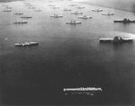 All three of the United States Navy’s aircraft carriers at the time, Langley, Saratoga, and Lexington, along with battleships and cruisers at anchor in Colon, Panama Canal Zone, roughly 1935.
