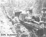 US Marine field gun mired in mud, Cape Gloucester, New Britain, 1944