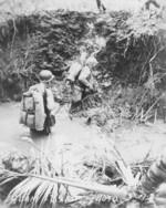 US Marines in a stream on Guam, Jul-Aug 1944