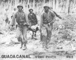 US Marines evacuating a wounded comrade, near Kokumbona River, Guadalcanal, Sep-Oct 1942