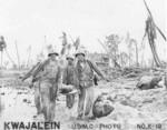 US Marines evacuating a wounded comrade, Kwajalein, Marshall Islands, Jan-Feb 1944