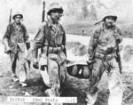 US Marines carrying the remains of a comrade, Saipan, Mariana Islands, Jun-Jul 1944