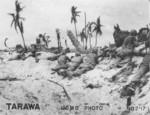 US Marines in prone position on the landing beach at Tarawa, Gilbert Islands, 20 Nov 1943, photo 2 of 2