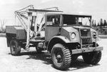 Canadian Chevrolet CMP 3-ton truck modified in the field into a wrecker and crane truck, date and location unknown.