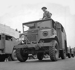Canadian Ford CMP Field Artillery Tractors pulling artillery pieces, date and location unknown.