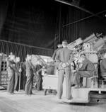 Chinese junior officers receiving instructions on loading a twin 4-inch gun, Chatham Gunnery School, England, United Kingdom, Aug 1945, photo 1 of 2