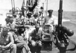 PT-377, an 80-foot Elco boat with MTB Squadron 27, transporting Vice Admiral Michiaki Kamada (seated) and staff to the signing of the Japanese surrender of Borneo aboard HMAS Burdekon in Makassar Strait, 8 Sep 1945