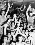 Recently liberated American prisoners of war at Aomori camp near Yokohama, Japan, circa 29 Aug 1945