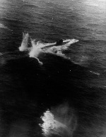A rocket attack on the German Type VIIC Submarine U-758 by TBF Avengers from USS Block Island northeast of the Azores, 11 Jan 1944. Note two rockets hitting just astern of the U-Boat. U-758 was damaged but not sunk.