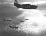 SB2C-4 Helldivers of Bombing Squadron VB-9 returning to the USS Lexington (Essex-class) after a strike in support of the US Marines on Iwo Jima, Bonin Islands, Feb 1945.