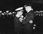 Bruce McCandless receiving the Medal of Honor from Ernest King aboard USS San Francisco, 12 Dec 1942 in San Francisco, California, United States. The medal was for night actions off Savo Island, Solomons, 12 Nov 1942.
