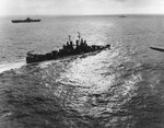 USS Vincennes (Cleveland-class) underway with the Third Fleet during operations against the Philippines, Dec 1944. Carrier USS Hancock is at left.