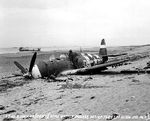 2 Jul 1944 photo of the wreckage left on Sword Beach following the D-Day landings in Normandy, France; in this case, a P-47 Thunderbolt that was shot down 10 Jun 1944 on a mission to Cherbourg, France. Photo 1 of 2.