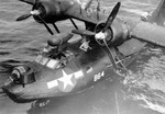 Black PBY-5A Catalina of Patrol Bombing Squadron VPB-54 pulled from the water at a base in the Philippines, late 1945.