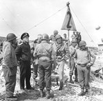 US Army and Navy invasion commanders waiting for the arrival of other flag officers on Omaha Beach, Saint-Laurent-sur-Mer, Normandy, France, the morning of 12 Jun 1944.