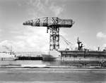 The 200-ton Hammerhead Crane fixed to Berth B-12 at the Repair Basins of the Naval Operating Base at Pearl Harbor, Hawaii, 5 Jan 1978. This crane was in use from 1935 and removed in 1986.