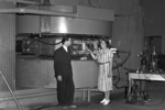 Paul Aebersold and Gladys Anslow at the 16 MeV 60-inch cyclotron at the University of California, Berkley in the United States, 1939