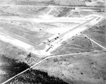 Aerial view of a glider training airstrip in Texas, 1943. Visible are C-47 Skytrain tow planes with Waco CG-4A gliders. Photo 3 of 5