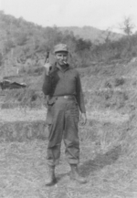 Member of US 5332nd Brigade (Provisional) Bill McCall with Colt hand gun, Burma, 1945