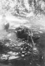 Members of US 5332nd Brigade (Provisional) Pastor and Dick Gerrity, near Shweli River, Burma, 1945