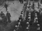 Taiwan Garrison Command Chief of Staff Ke Yuanfen inspecting Japanese internees at the former Taihoku General Government Building, Taipei, Taiwan, Republic of China, 1946, photo 1 of 2