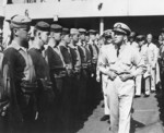 Rear Admiral Alan Kirk inspecting the crew of USS Ancon, Sep 1943