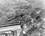 Aerial view of New York Navy Yard, Brooklyn, New York, United States, 15 Apr 1945; note USS Reprisal, USS Coral Sea/Franklin D. Roosevelt, USS Kearsarge, and USS Oriskany under construction