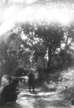 Members of US 5332nd Brigade (Provisional) resting on a trail, Burma, 1945