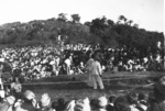 Spectators watching a fire walker, Calcutta, India, late 1944, photo 4 of 5