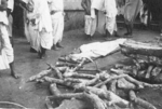 Civilians preparing the remains of the deceased for cremation, Fiji, 1942-1944