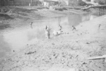 Civilians bathing in a river, India, late 1944