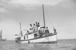 Civilians in a launch travelling between Vita Levu island and Levuka on Ovalau island, Fiji, 1942-1944