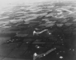 Two B-17 Fortresses of the 94th Bombardment Group approaching an airfield in England, United Kingdom, 28 Jun 1943 (aircraft serial numbers 42-30382 above and 42-30376 below).