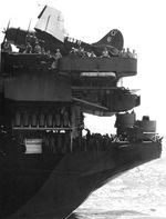 Fantail of the carrier USS Hancock in the western Pacific, Dec 1944. Note SB2C Helldiver on the after flight deck and the aircraft’s horseshoe tail geometric identifying it as from Bombing Squadron 7 from the Hancock